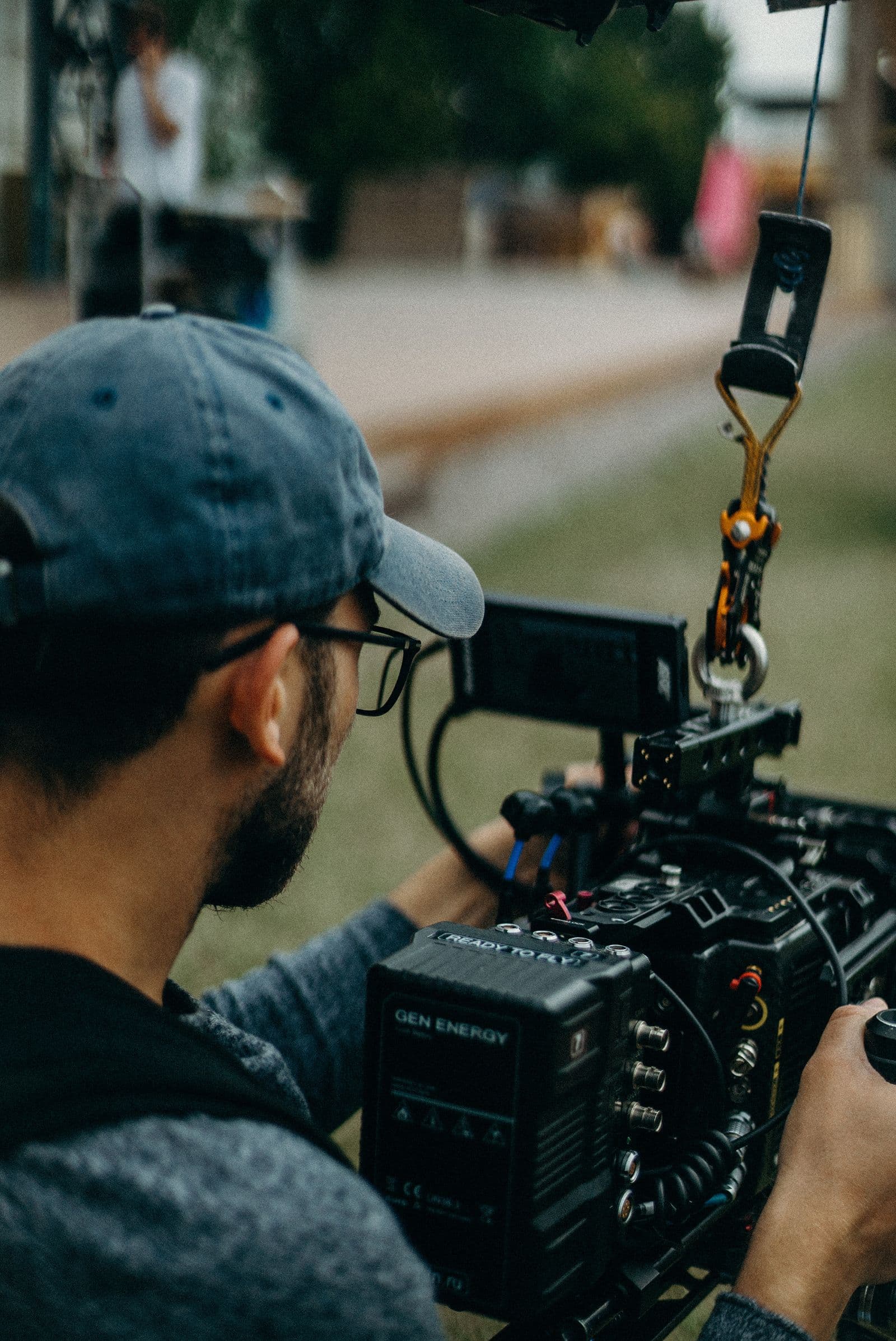 A camera operator framing a shot
